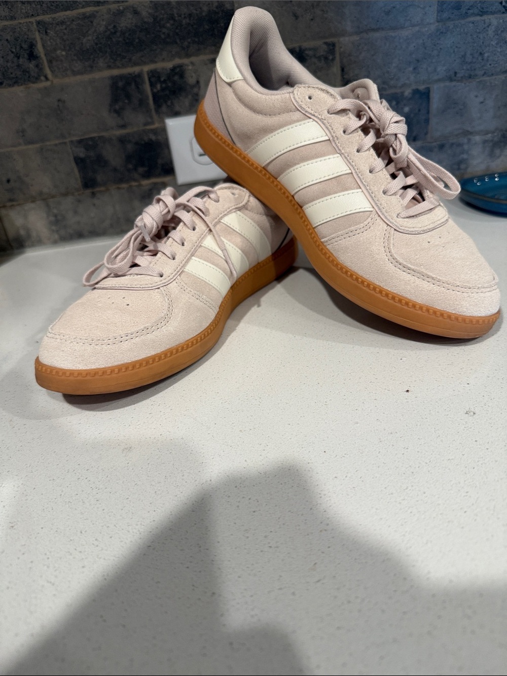 adidas women’s Low-Top Suede Sneakers in Light Pink with Gum Sole